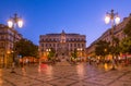 Sunset over Luis de Camoes square in Lisbon, Portugal. Royalty Free Stock Photo